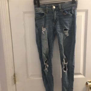 blue american eagle ripped jeans